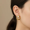 Pearl embrace drops earrings