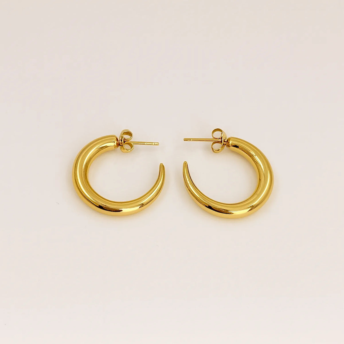 Curbs bold gold hoops earring